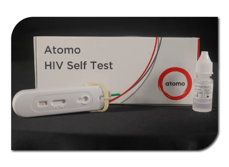 A box of Atomo HIV self-test and a liquid bottle, essential for conducting self-testing at home